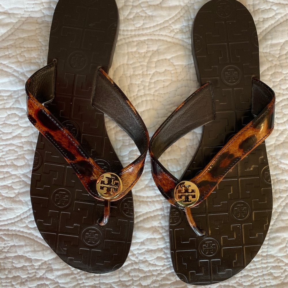 Tory Burch animal print leather flip flops